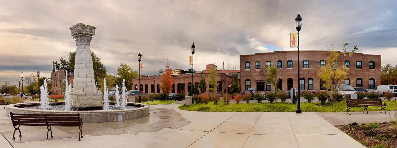 A stone fountain sits in the center of a courtyard outside the Wirework building in Lafayette Square in St. Louis